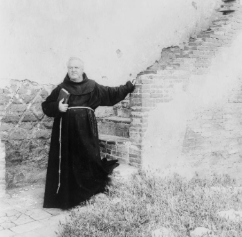Father Joseph Jeremias O’Keefe standing at the brick steps of Mission San Luis Rey - 1900